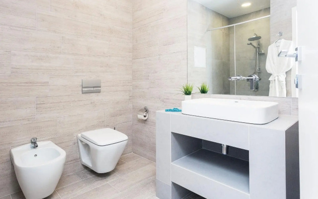Stilnye apartamenty s dvumya spalnyami v tsentre Apartments