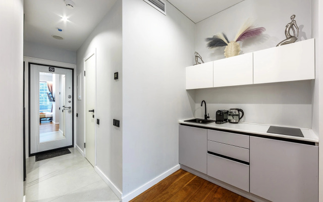 Апартаменты Комфортная студия на 35 этаже башни Оko