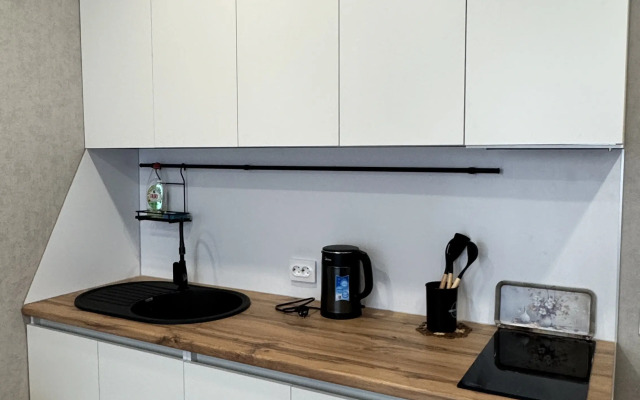V Novom Dome Flat