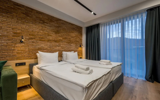 Апарт-отель New Gudauri Atrium Modern Apartments with Ski in/out