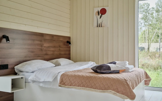 Частный дом с сауной, детской и спортивной площадкой