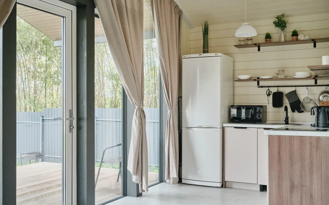 Частный дом с сауной, детской и спортивной площадкой