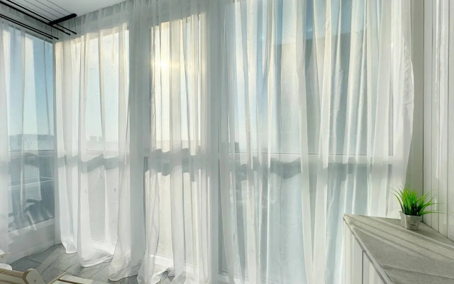 Квартира Уютная студия с панорамной лоджией