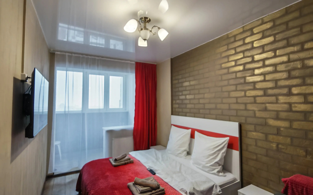 Апартаменты Яркая студия на высоком этаже