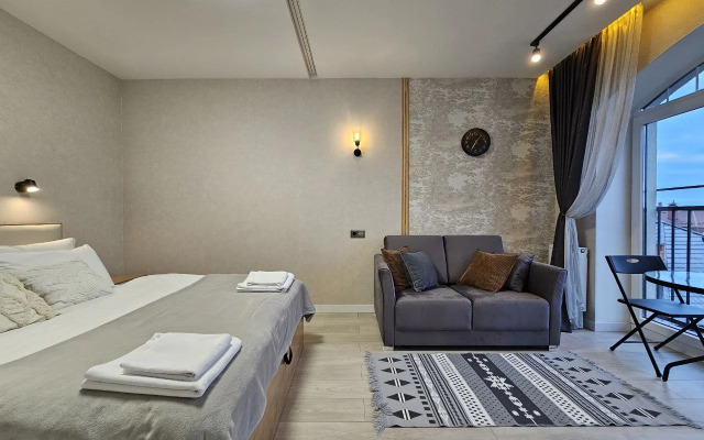 Квартира лофт над елями