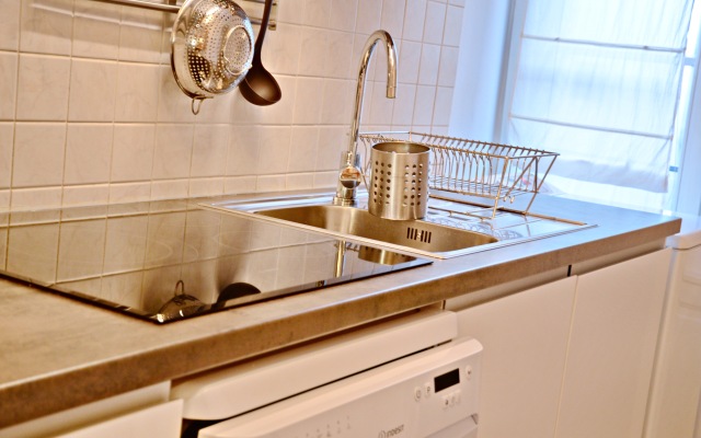 Quatre Chaises Apartments