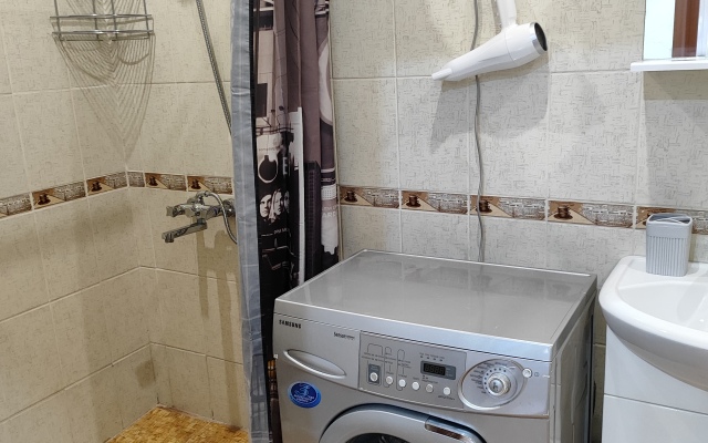 V Tsentre Goroda Apartments