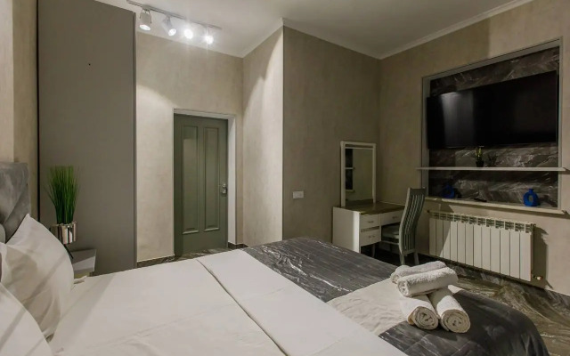 Квартира Уютная с двуспальной кроватью и диваном