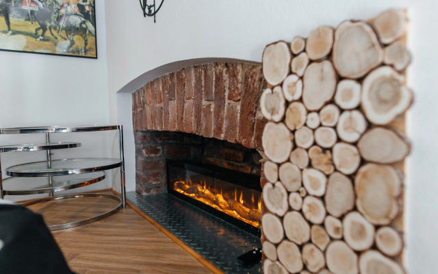 Апартаменты ApartH с видом на город и камином