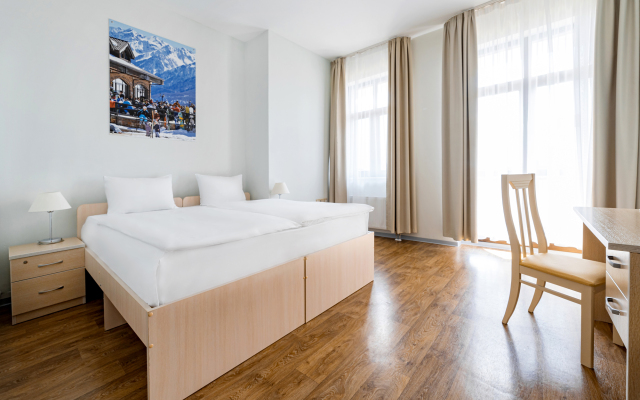 Отель Ski Inn Hotel Rosa Khutor