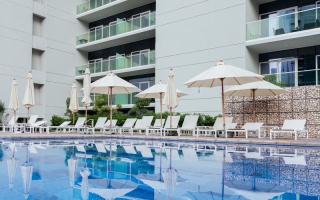 Апартаменты Luxurious 1BR at Keyrock Pool & Gym Access