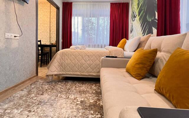 V Tsentre Goroda Apartments