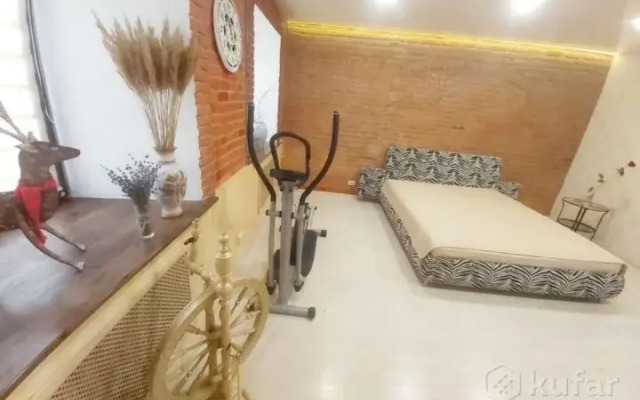 V Tsentre Goroda Apartments