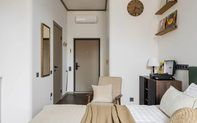 Квартира New Horizon Art Vinil 36 с дизайном бутикотеля и виниловым проигрывателем