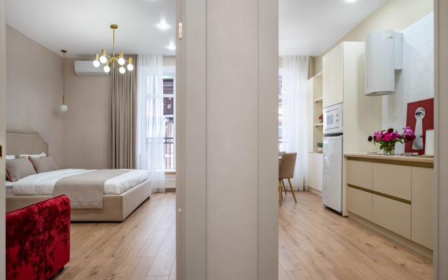 V Samom Tsentre Flat
