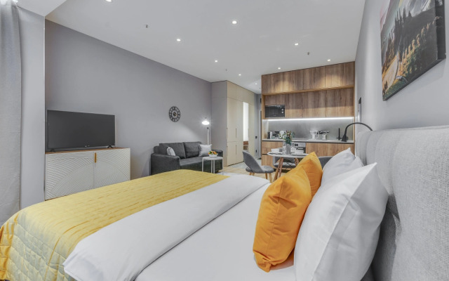 Апартаменты Трёхместные Делюкс с Видом на Город Business Apartments