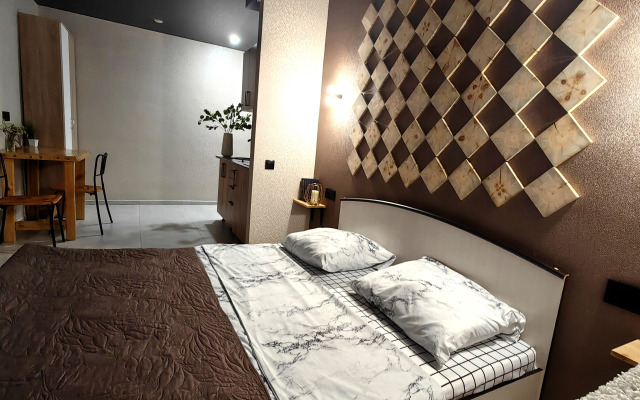 Апартаменты Уютная студия напротив университета и парка в центре Нефтяников