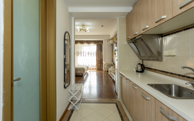 Отель Hong Xiyuan Apartment Hotel Wada Plaza