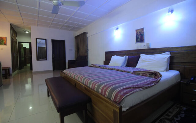 Whispering Palms Hotel and Resort