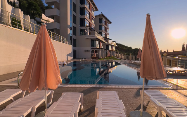 Апартаменты магнолия с зоной патио и отдельной спальней