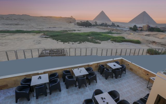 Pyramids land Hotel