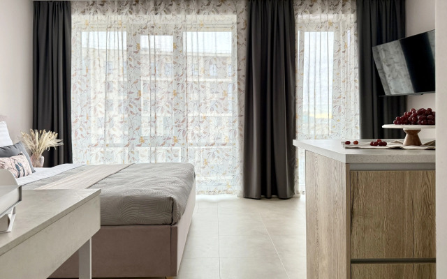 Апартаменты Уютная Студия в центре города