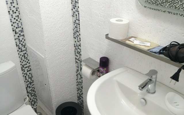 V Tsentre Goroda Apartments