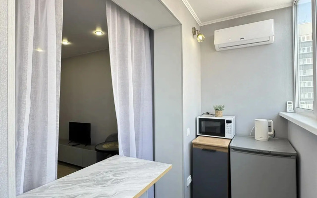 Апартаменты Уютная студия в развитом районе города