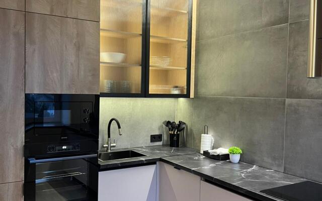Dizaynerskaya v stile Loft Flat