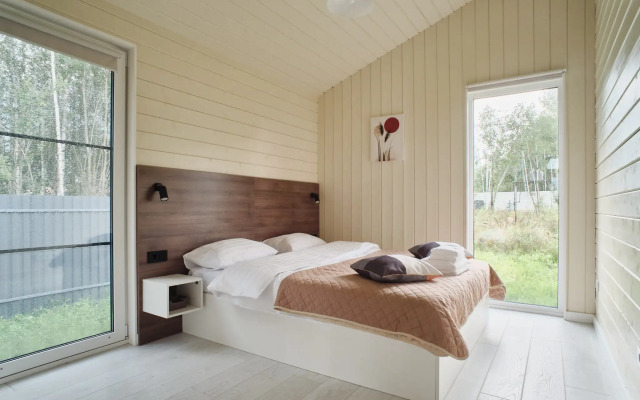 Частный дом с сауной, детской и спортивной площадкой