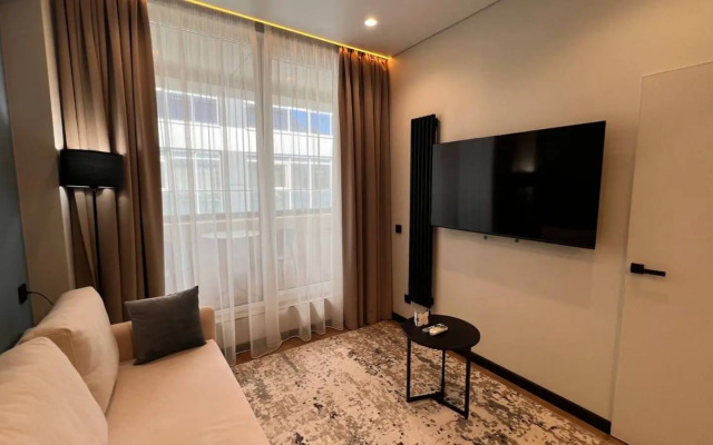 Апартаменты Студия на Учительской 3