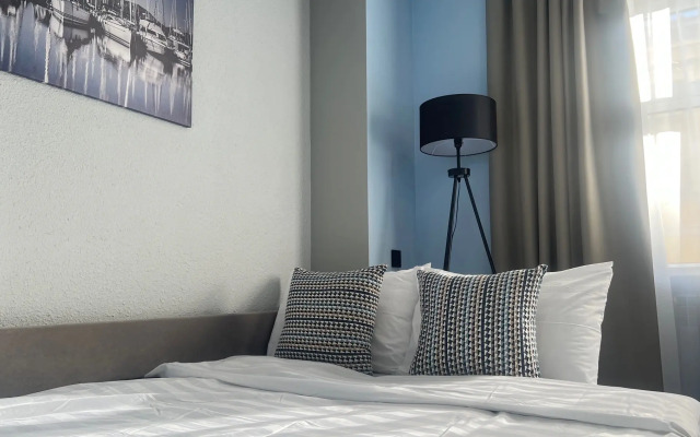U Chasovoy Bashni Golubye Apartments