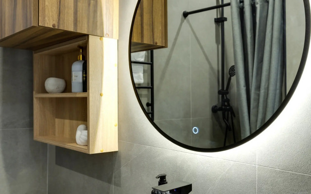 Апартаменты Уютная Студия у Метро Ботанический Сад