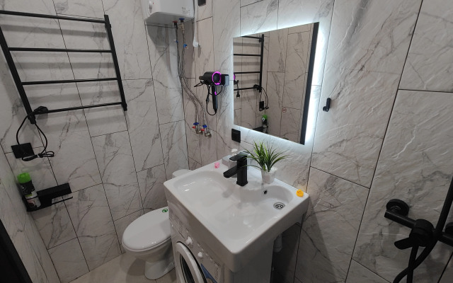 Апартаменты Уютная студия напротив университета и парка в центре Нефтяников