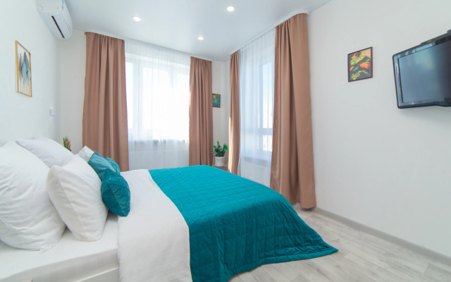 Na 16 Etazhe s Zavorazhivayuschimi Zakatami Apartments