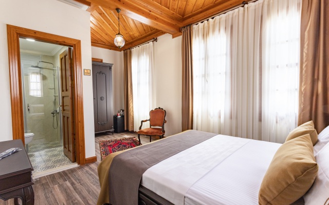 Отель WOO Town Suites