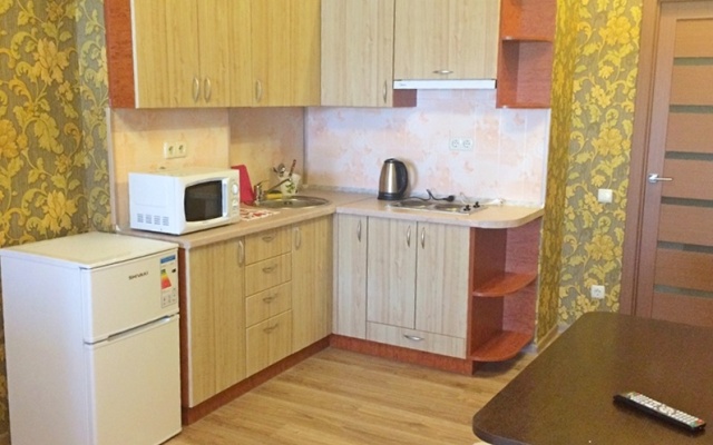 V Tsentre Goroda Apartments