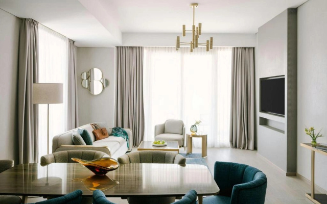 Отель Aura Suites Downtown