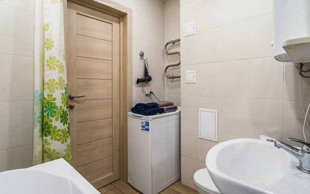 Уютные Апартаменты в доме у Космопорта (ул. Дыбенко 27а)