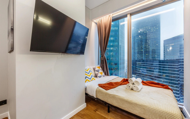 Апартаменты Комфортная студия на 35 этаже башни Оko