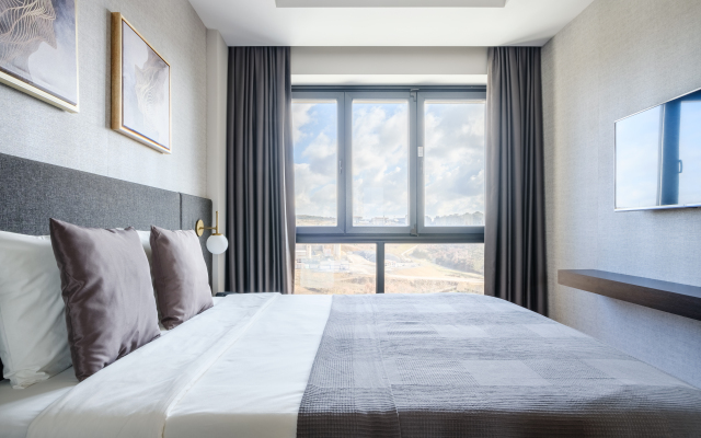 Grand Residence by NewInn Apartments