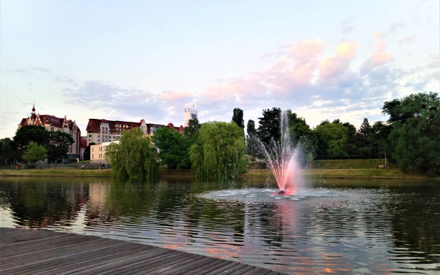 2-К V Tsentre U Ozera Apartments