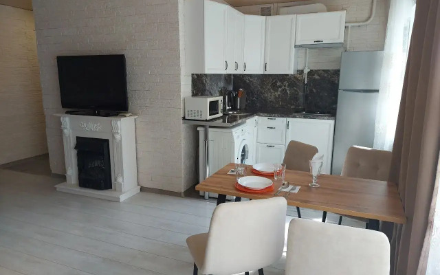 Uyutnaya V Tsentre S Kaminom Flat