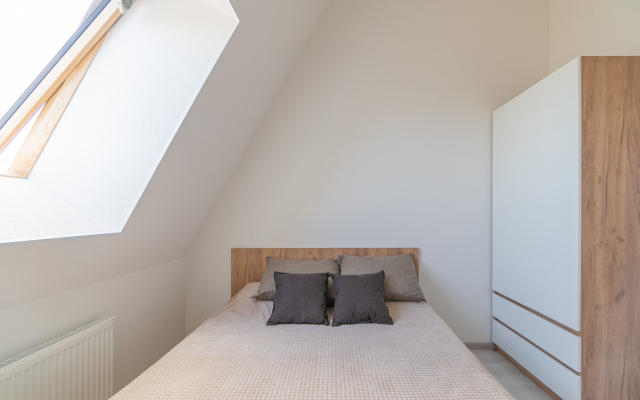 Апартаменты Двухкомнатная Квартира на Мансардном Этаже