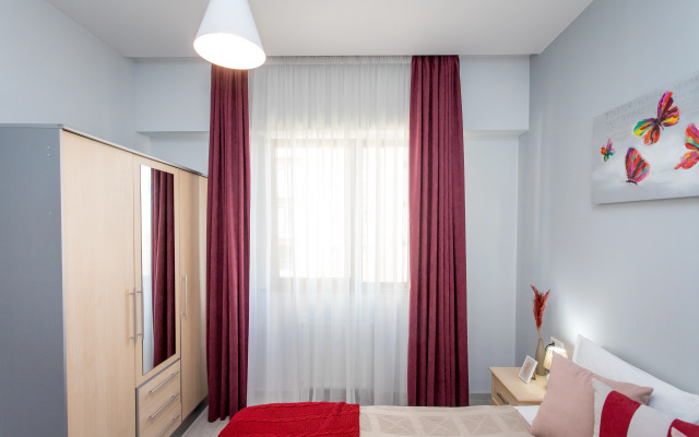 Apartments with a View of the Ferris Wheel and the City