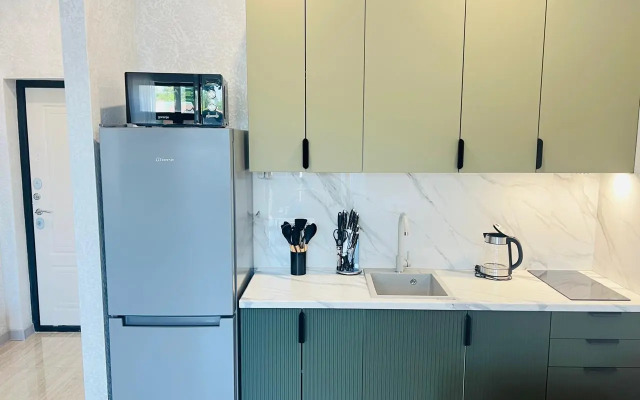 Uyutnye apartamenty s vidom na basseyn Apartments