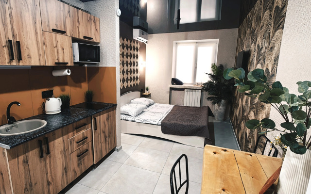 Апартаменты Уютная студия напротив университета и парка в центре Нефтяников