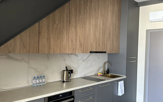 Апартаменты Двухуровневые апартаменты с балконом