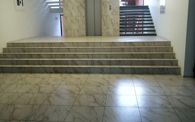V Tsentre Goroda Apartments