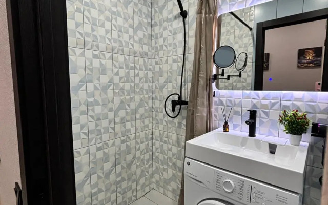 Апартаменты Потрясающая студия напротив терминала в центре Нефтяников